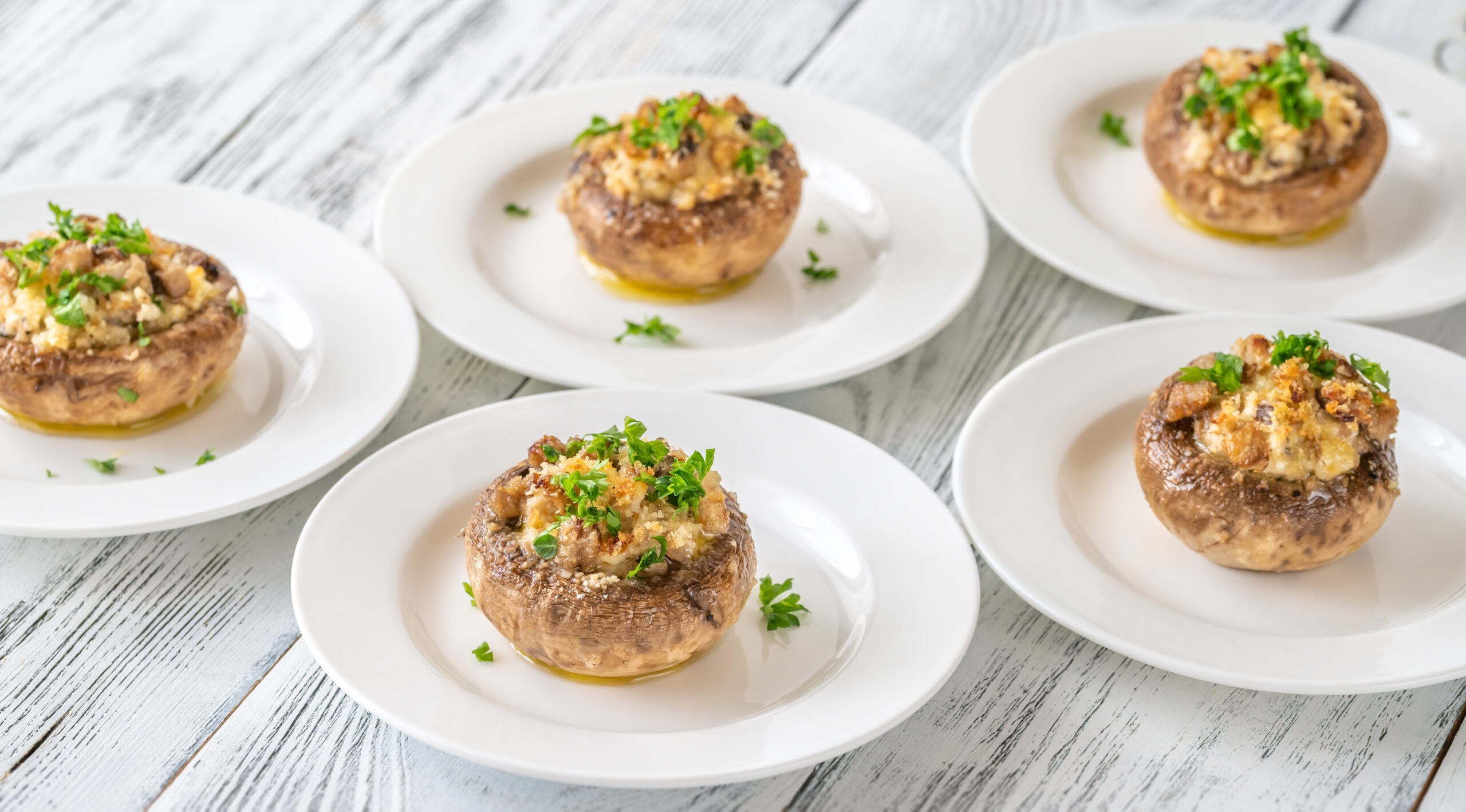 Stuffed mushroom caps with cream cheese, breadcrumbs and parmesan